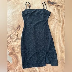 Black sparkly mini dress with small slit